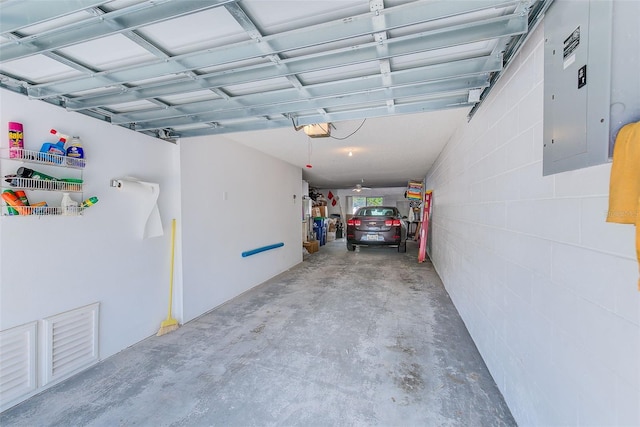 615 Garland Cir, Indian Rocks Beach, FL 33785 - garage with electric panel and a garage door opener