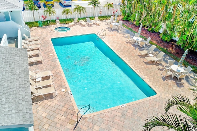 615 Garland Cir, Indian Rocks Beach, FL 33785 - community pool with a hot tub and a patio