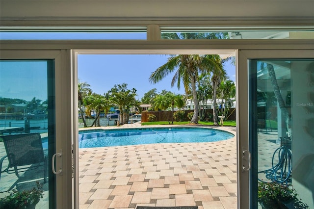 6667 28th St S, Saint Petersburg, FL 33712 - view of pool with a fenced in pool, fence, and a patio area