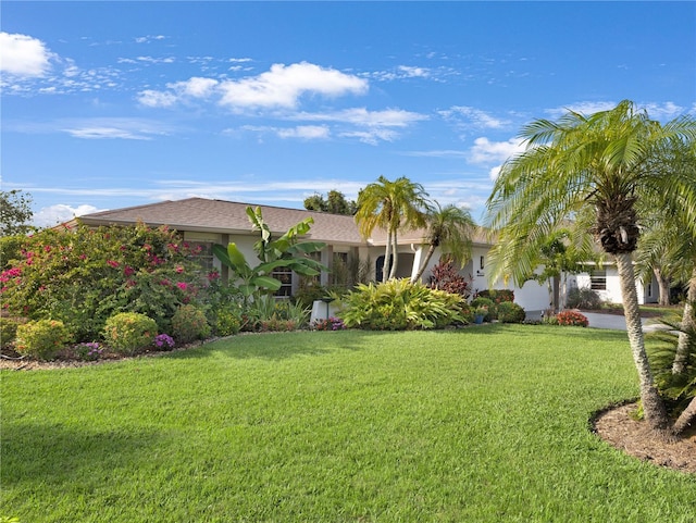 3323 Ringwood Mdw, Sarasota, FL 34235 - view of front of property with a front yard and stucco siding