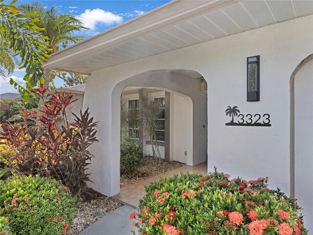 3323 Ringwood Mdw, Sarasota, FL 34235 - property entrance featuring stucco siding