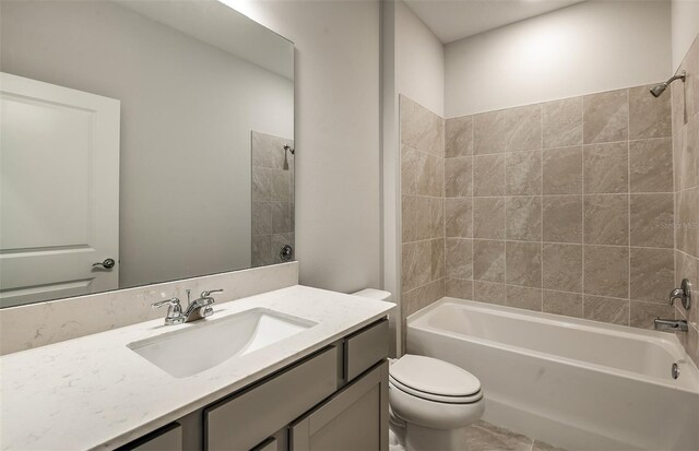 full bathroom featuring vanity, toilet, and bathtub / shower combination