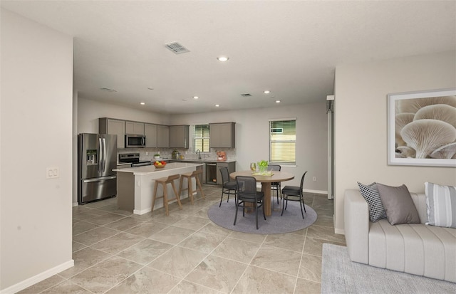 8249 SW 52nd Lane Rd, Ocala, FL 34481 - dining space featuring baseboards and recessed lighting