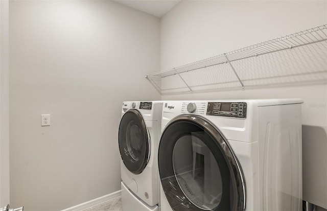 8249 SW 52nd Lane Rd, Ocala, FL 34481 - washroom featuring independent washer and dryer and baseboards