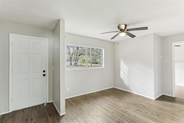 7711 Amherst St Unit A & B, Tampa, FL 33625 - foyer entrance featuring a ceiling fan, wood finished floors, and baseboards