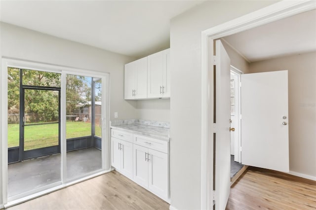 7711 Amherst St Unit A & B, Tampa, FL 33625 - laundry room with light wood-style floors