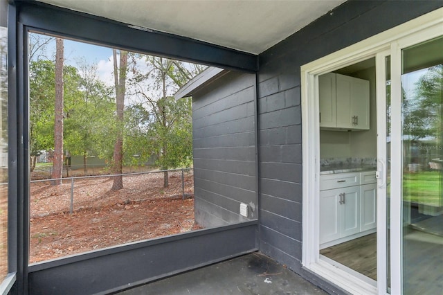 7711 Amherst St Unit A & B, Tampa, FL 33625 - unfurnished sunroom with plenty of natural light