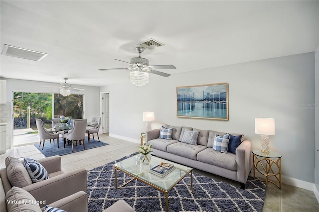 1832 Flamingo Dr, North Fort Myers, FL 33917 - living area with baseboards, visible vents, and a ceiling fan