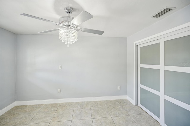 1832 Flamingo Dr, North Fort Myers, FL 33917 - spare room featuring baseboards, visible vents, tile patterned floors, and a ceiling fan
