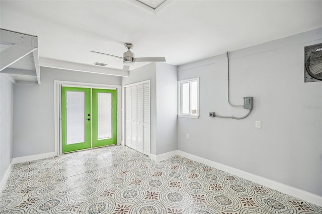 1832 Flamingo Dr, North Fort Myers, FL 33917 - spare room featuring baseboards, ceiling fan, visible vents, and french doors