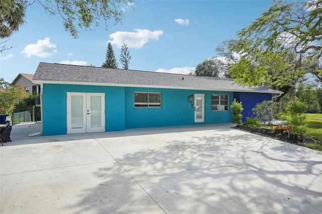 1832 Flamingo Dr, North Fort Myers, FL 33917 - ranch-style home featuring french doors and stucco siding