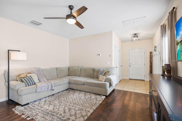 14426 Haddon Mist Dr, Wimauma, FL 33598 - living room with visible vents, light wood-style floors, and a ceiling fan