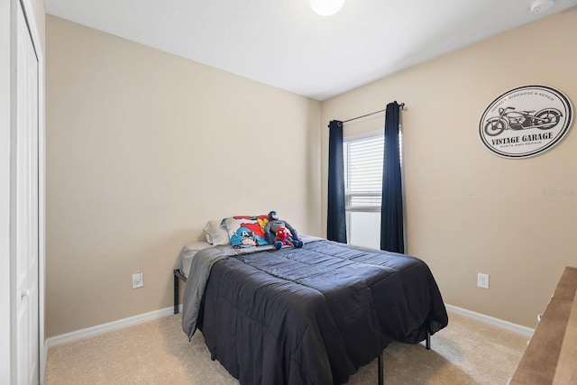 14426 Haddon Mist Dr, Wimauma, FL 33598 - bedroom with light carpet and baseboards