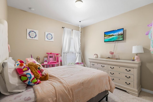 14426 Haddon Mist Dr, Wimauma, FL 33598 - bedroom with light carpet and baseboards