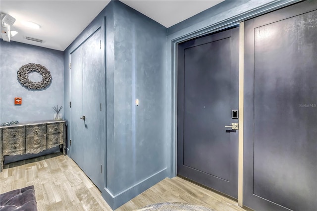19816 Gulf Blvd Unit 201, Indian Shores, FL 33785 - entryway with visible vents and light wood-style floors