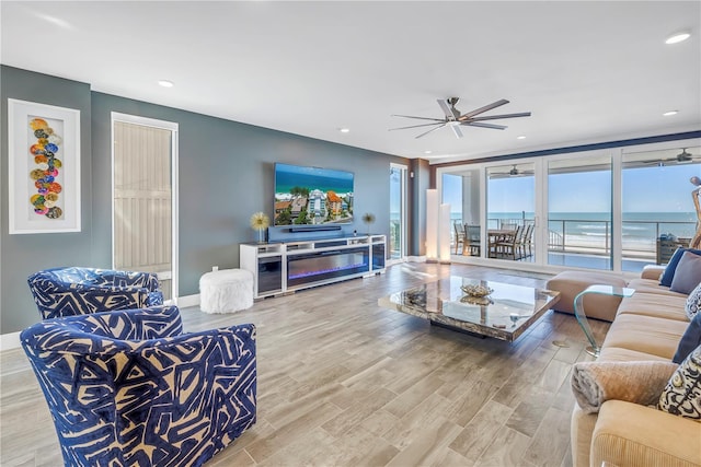 19816 Gulf Blvd Unit 201, Indian Shores, FL 33785 - living room featuring ceiling fan, recessed lighting, and wood finished floors