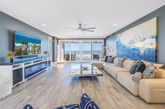 19816 Gulf Blvd Unit 201, Indian Shores, FL 33785 - living area featuring ceiling fan, recessed lighting, and wood finished floors