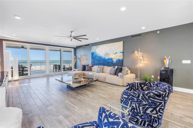 19816 Gulf Blvd Unit 201, Indian Shores, FL 33785 - living area with a ceiling fan, recessed lighting, visible vents, and wood finished floors
