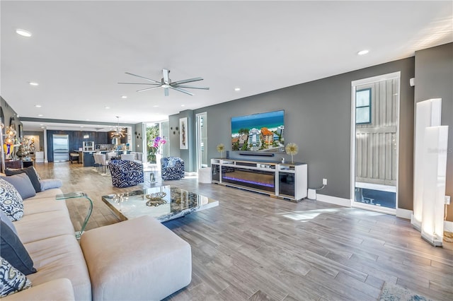 19816 Gulf Blvd Unit 201, Indian Shores, FL 33785 - living area with ceiling fan, recessed lighting, baseboards, and wood finished floors