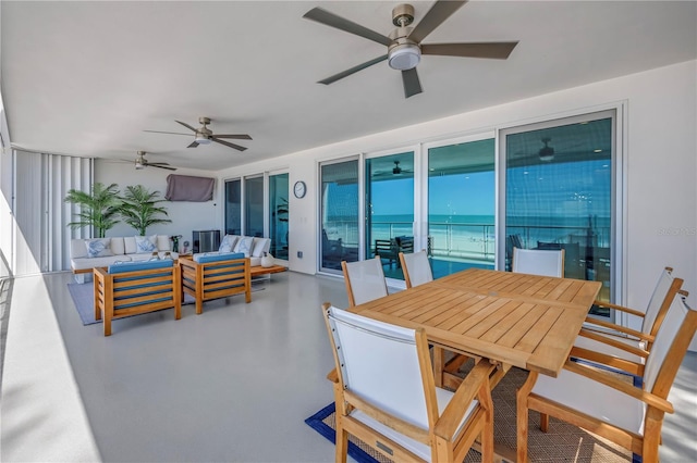 19816 Gulf Blvd Unit 201, Indian Shores, FL 33785 - view of patio with ceiling fan, an outdoor hangout area, and outdoor dining space