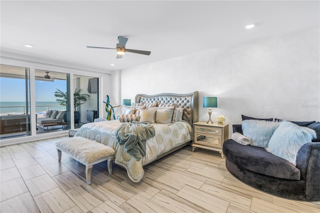 19816 Gulf Blvd Unit 201, Indian Shores, FL 33785 - bedroom with a water view, access to outside, a ceiling fan, and recessed lighting