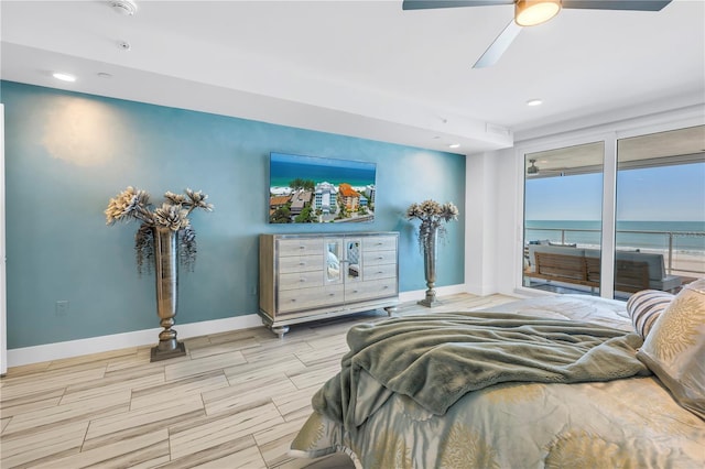19816 Gulf Blvd Unit 201, Indian Shores, FL 33785 - bedroom featuring wood tiled floor, recessed lighting, baseboards, ceiling fan, and access to outside
