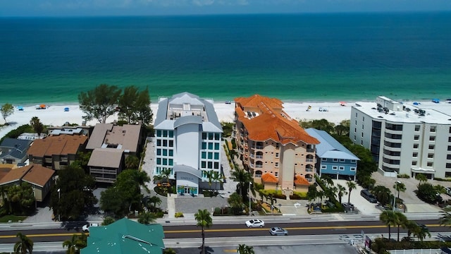 19816 Gulf Blvd Unit 201, Indian Shores, FL 33785 - drone / aerial view featuring a water view and a beach view
