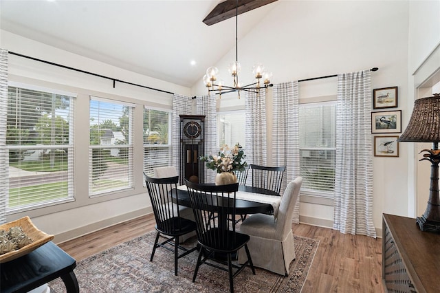 2910 W Aquilla St, Tampa, FL 33629 - dining area featuring a chandelier, high vaulted ceiling, wood finished floors, baseboards, and beamed ceiling
