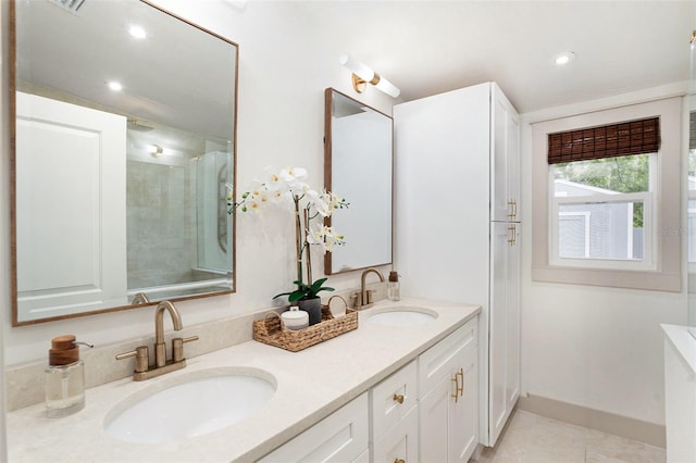2910 W Aquilla St, Tampa, FL 33629 - full bath featuring a shower, double vanity, recessed lighting, and tile patterned floors