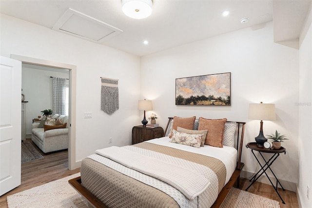2910 W Aquilla St, Tampa, FL 33629 - bedroom with attic access, light wood-style flooring, recessed lighting, and baseboards