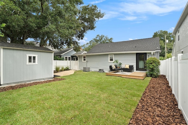 2910 W Aquilla St, Tampa, FL 33629 - view of yard featuring a wooden deck, central AC unit, an outbuilding, and an outdoor living space