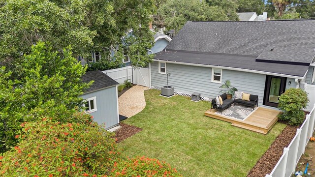 2910 W Aquilla St, Tampa, FL 33629 - rear view of house with a deck and roof with shingles