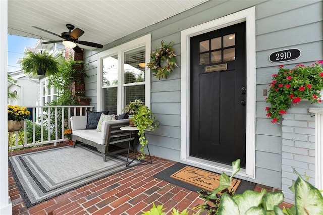 2910 W Aquilla St, Tampa, FL 33629 - view of exterior entry featuring a porch and a ceiling fan