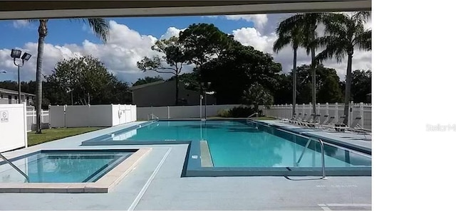 pool featuring fence