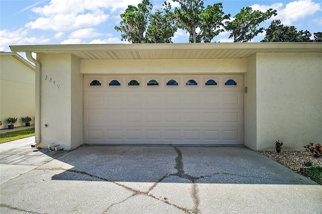garage with driveway