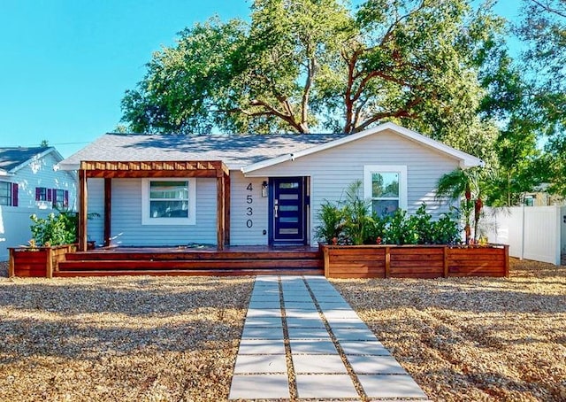 4530 5th Ave S, Saint Petersburg, FL 33711 - view of front of house with fence and covered porch