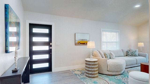 4530 5th Ave S, Saint Petersburg, FL 33711 - living area featuring wood finished floors, baseboards, and recessed lighting
