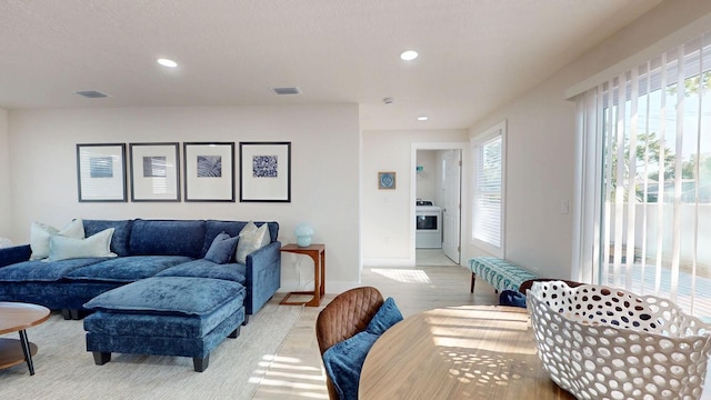 4530 5th Ave S, Saint Petersburg, FL 33711 - living area featuring light wood-style floors, recessed lighting, and baseboards