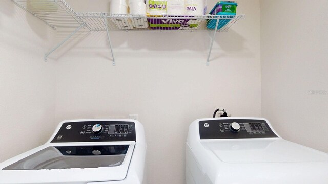 4530 5th Ave S, Saint Petersburg, FL 33711 - laundry room featuring separate washer and dryer