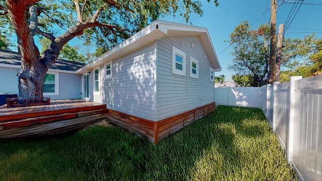 4530 5th Ave S, Saint Petersburg, FL 33711 - view of property exterior featuring a wooden deck