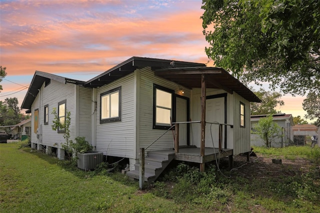 2920 E 20th Ave, Tampa, FL 33605 - exterior space featuring a lawn, fence, and central AC
