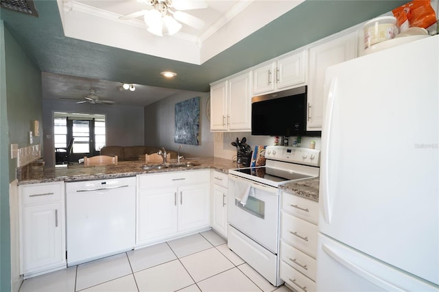 7360 Ulmerton Rd Unit 29B, Largo, FL 33771 - kitchen featuring white appliances, a ceiling fan, ornamental molding, light tile patterned floors, and white cabinets