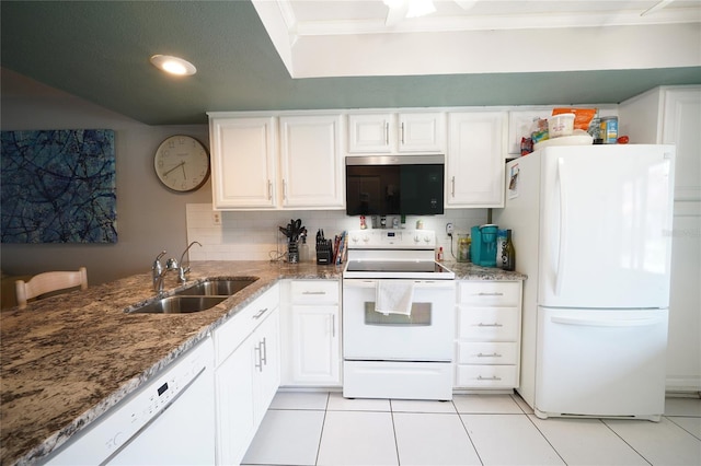7360 Ulmerton Rd Unit 29B, Largo, FL 33771 - kitchen featuring white appliances, crown molding, white cabinetry, light tile patterned floors, and light stone counters