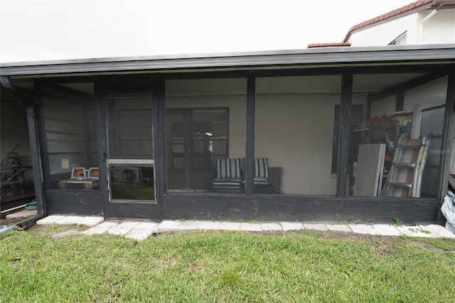 7360 Ulmerton Rd Unit 29B, Largo, FL 33771 - rear view of property featuring a sunroom and a yard