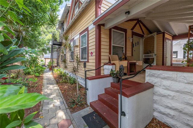 548 3rd St N, Saint Petersburg, FL 33701 - view of home's exterior featuring covered porch