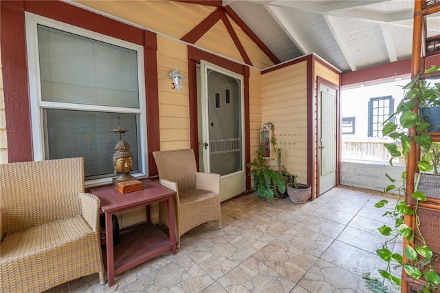 548 3rd St N, Saint Petersburg, FL 33701 - view of exterior entry featuring covered porch