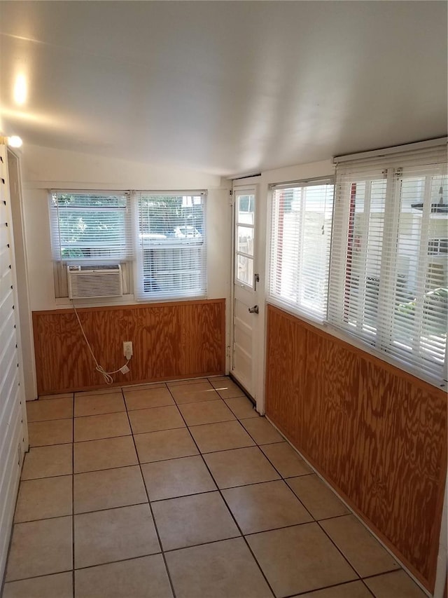 548 3rd St N, Saint Petersburg, FL 33701 - kitchen featuring light tile patterned floors and cooling unit