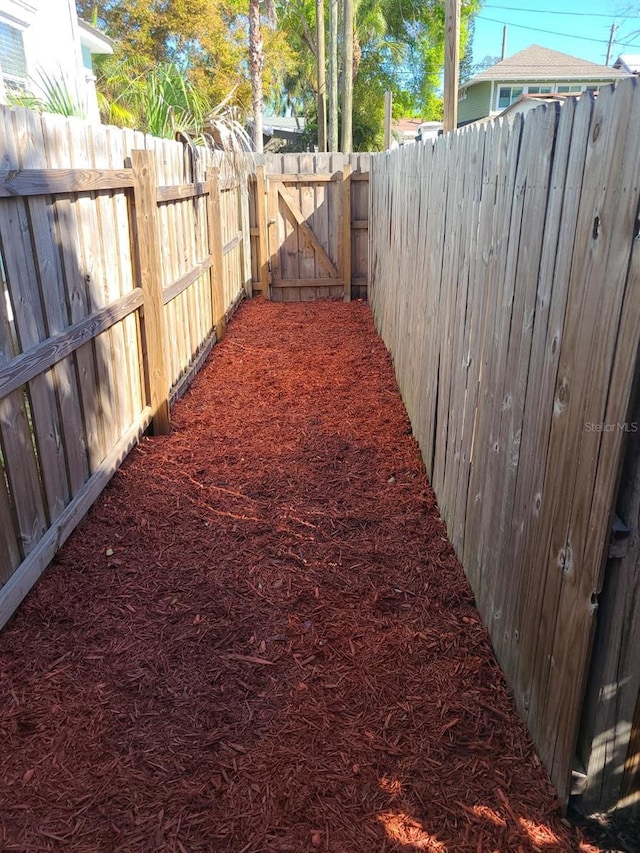 548 3rd St N, Saint Petersburg, FL 33701 - view of yard featuring a fenced backyard