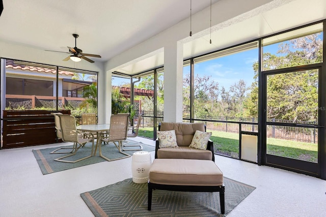 14241 Natures Reserve Dr, Lithia, FL 33547 - sunroom with ceiling fan, outdoor dining space, and an outdoor hangout area