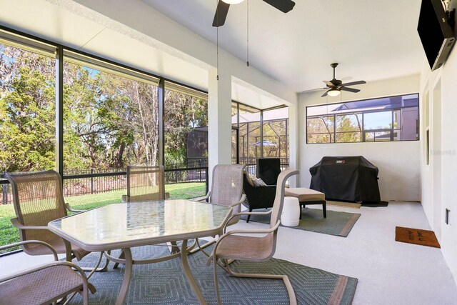 14241 Natures Reserve Dr, Lithia, FL 33547 - sunroom featuring a ceiling fan, outdoor dining space, and healthy amount of natural light